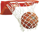 A basketball sits in the net of a basketball hoop, indicating a point scored during a game.